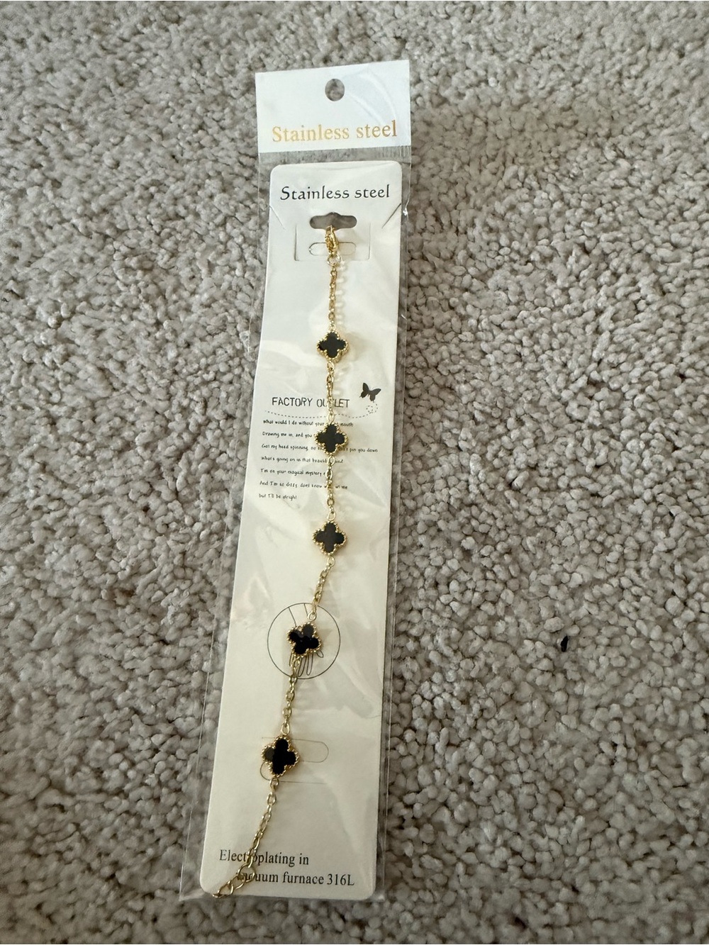 Stainless Steel Gold Bracelet with Black Clover Accents